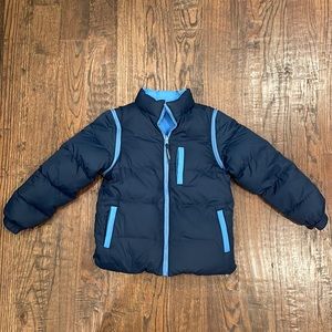 Reversible puffy jacket with removable sleeves